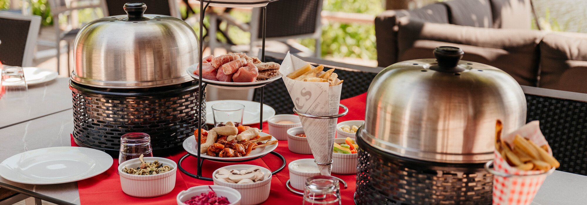 Table set with two table grill sets on the terrace